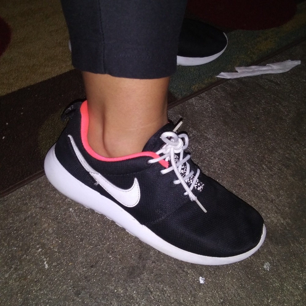 Black and pink Nike's
